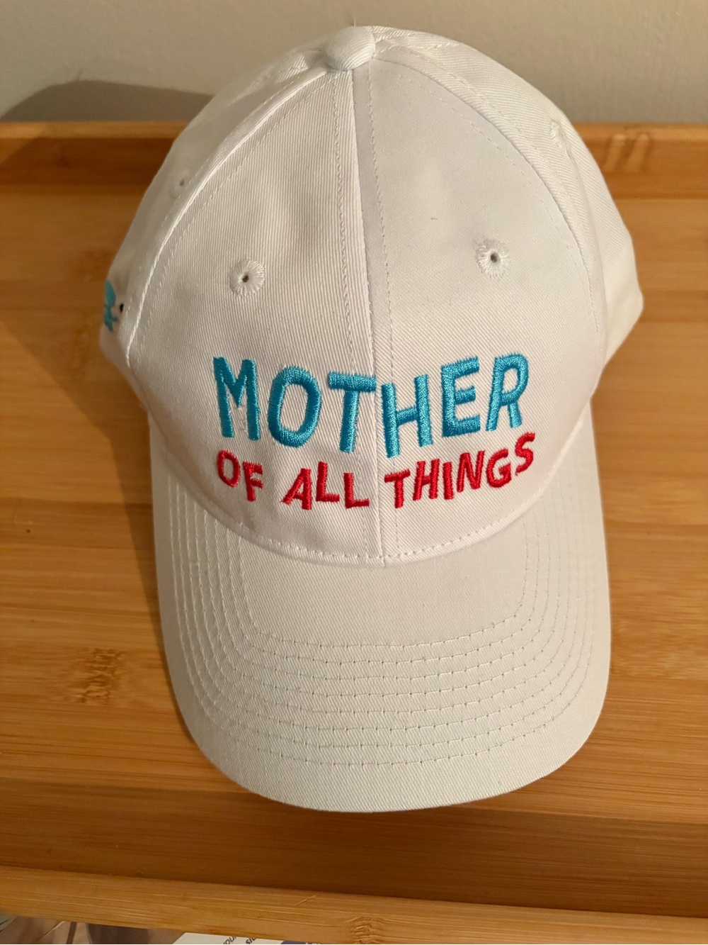 Mother of All Things Dr Seuss 
White Baseball Cap, Turquoise & Red Embroidery